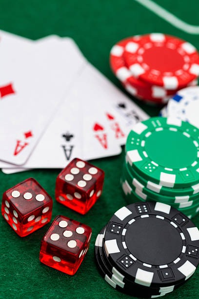 Live casino studio with professional dealers managing blackjack and roulette tables